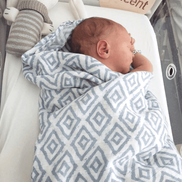 Baby mit Pucktuch